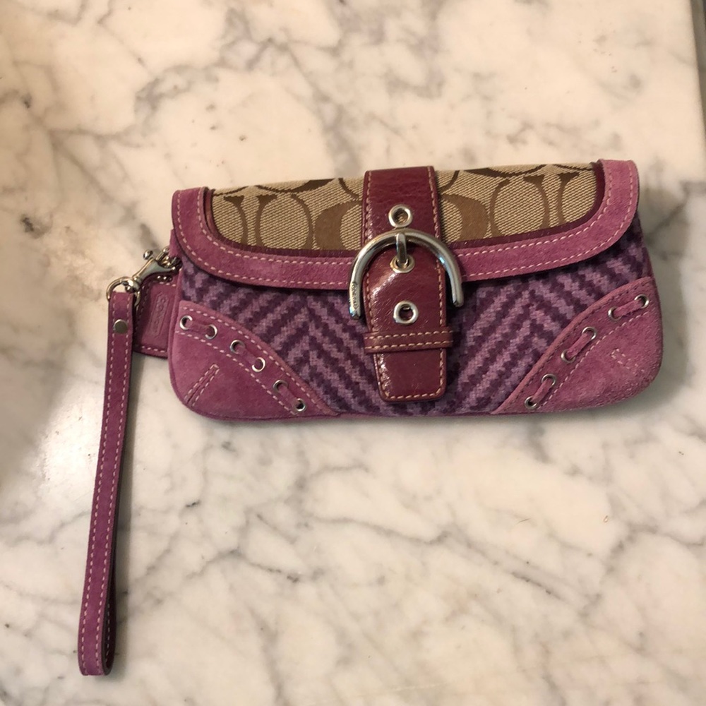 Coach girly wristlet. Strap removable.